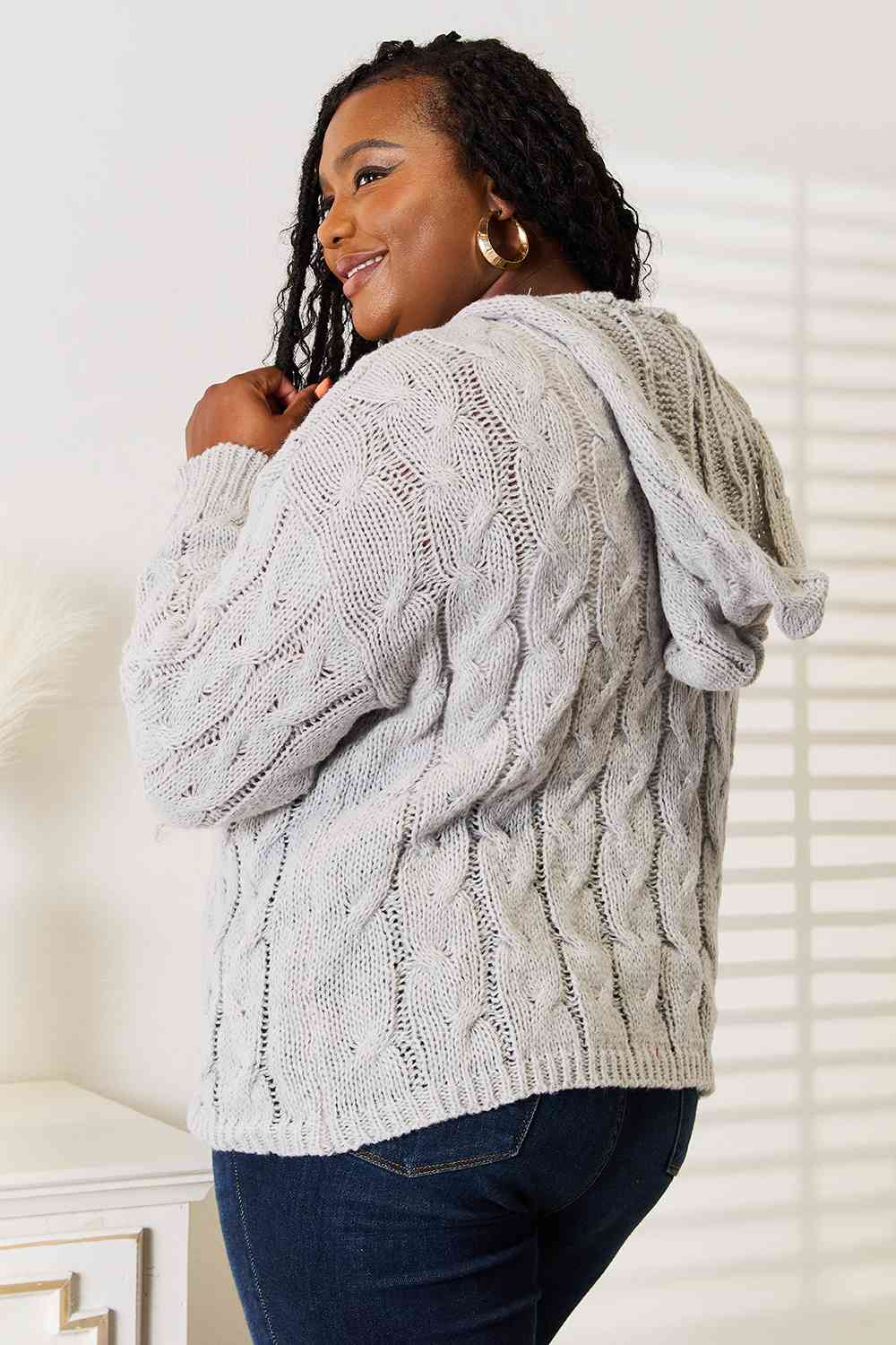 Cozy Up in Cable-Knit Hooded Sweater