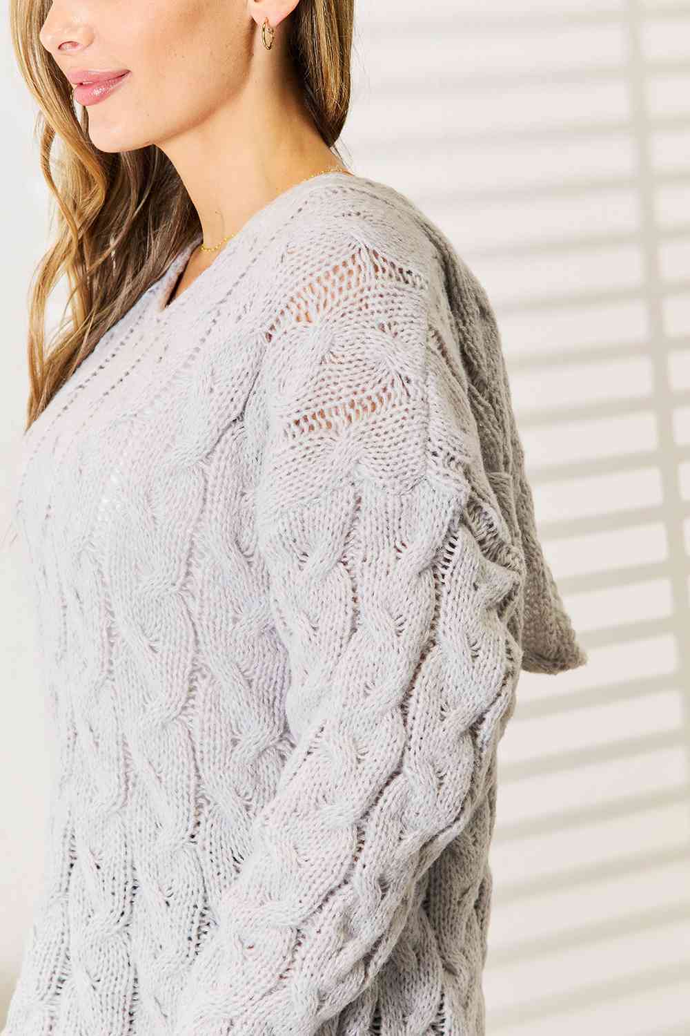 Cozy Up in Cable-Knit Hooded Sweater